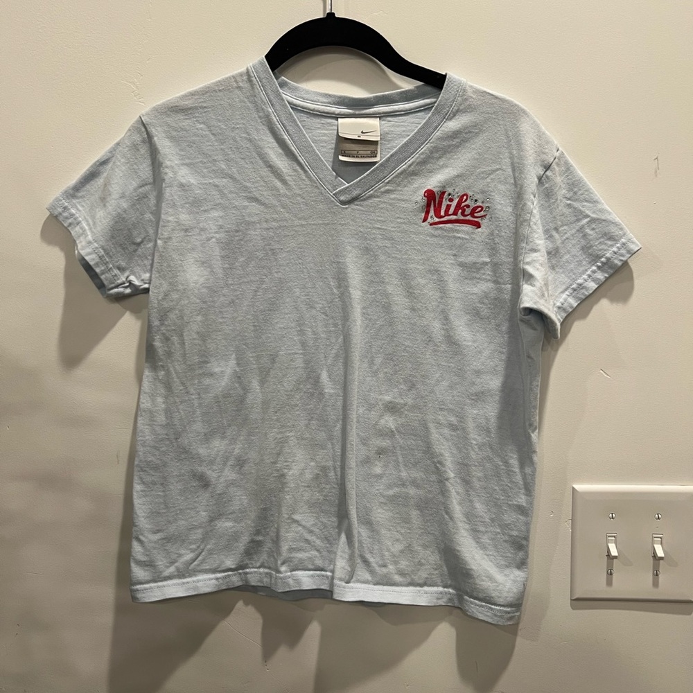 Light blue Nike tee, with red rhinestone detail